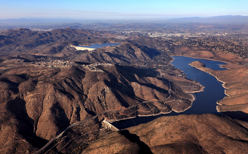 An aerial photo of the Olivenhain and Hodges Reservoirs and surrounding hills and neighborhoods.